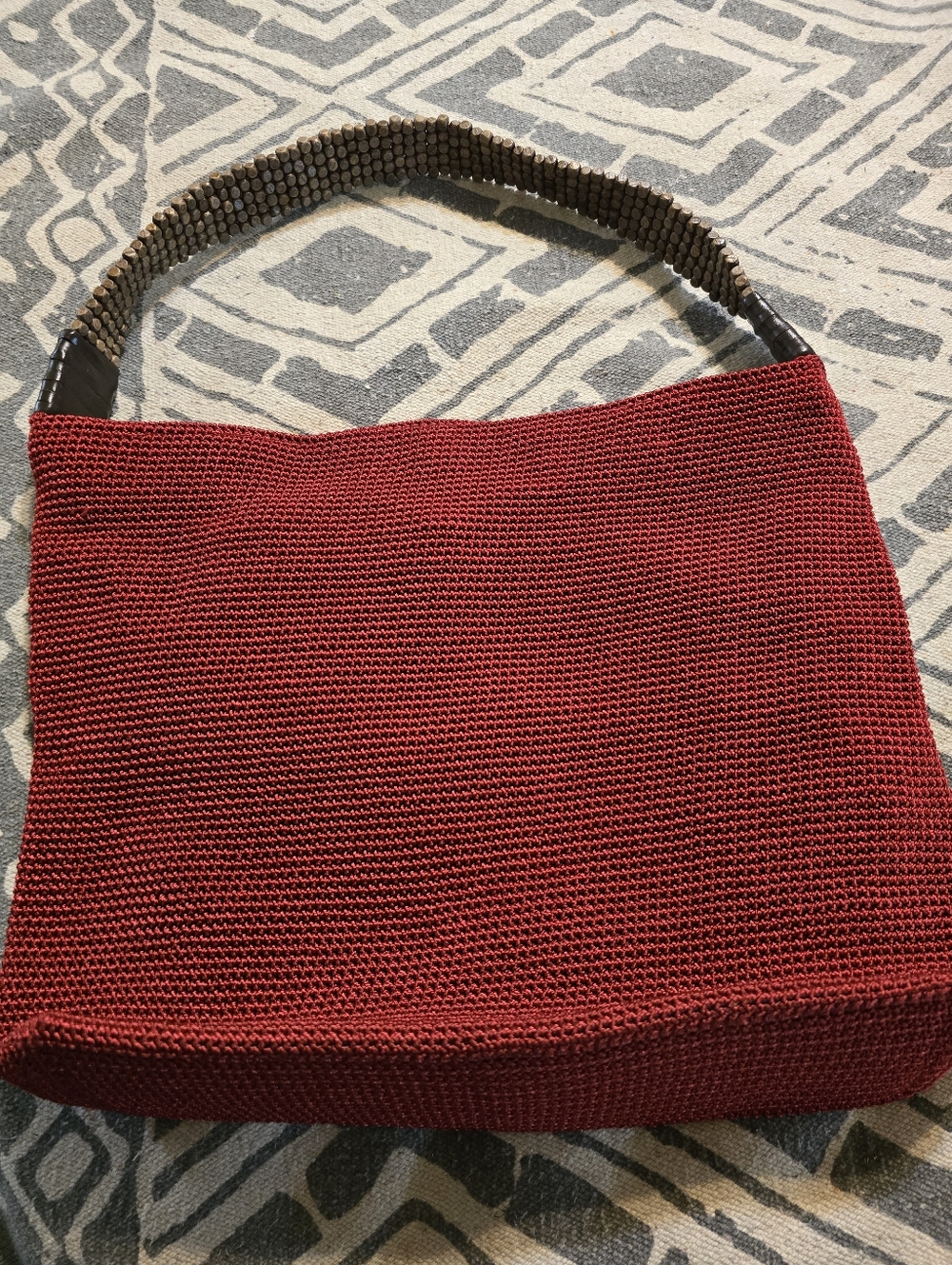 The Sak Red Tight-Weave Hand or Shoulder Bag with Beaded Strap